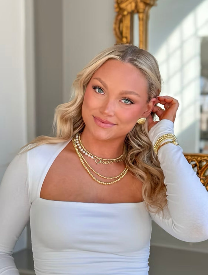 SOLD: Easton Elle Gold Shell Studs
