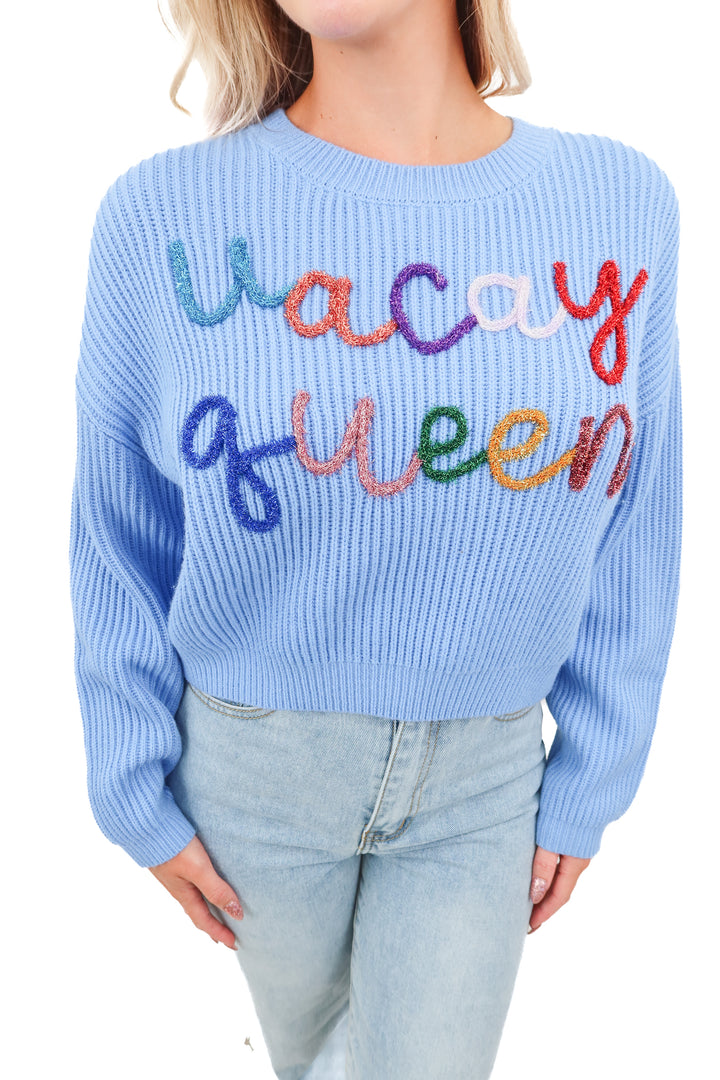 Queen of Sparkles vacay queen blue sweater (XS; retail $350)