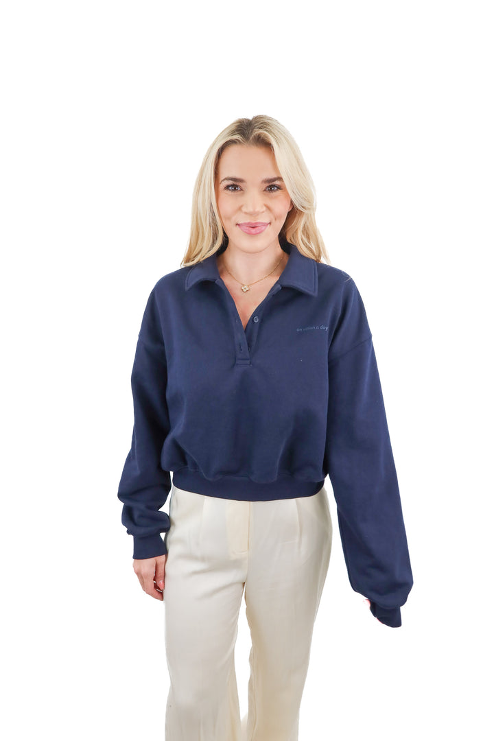 an action a day navy quarter zip (m; retail $130)