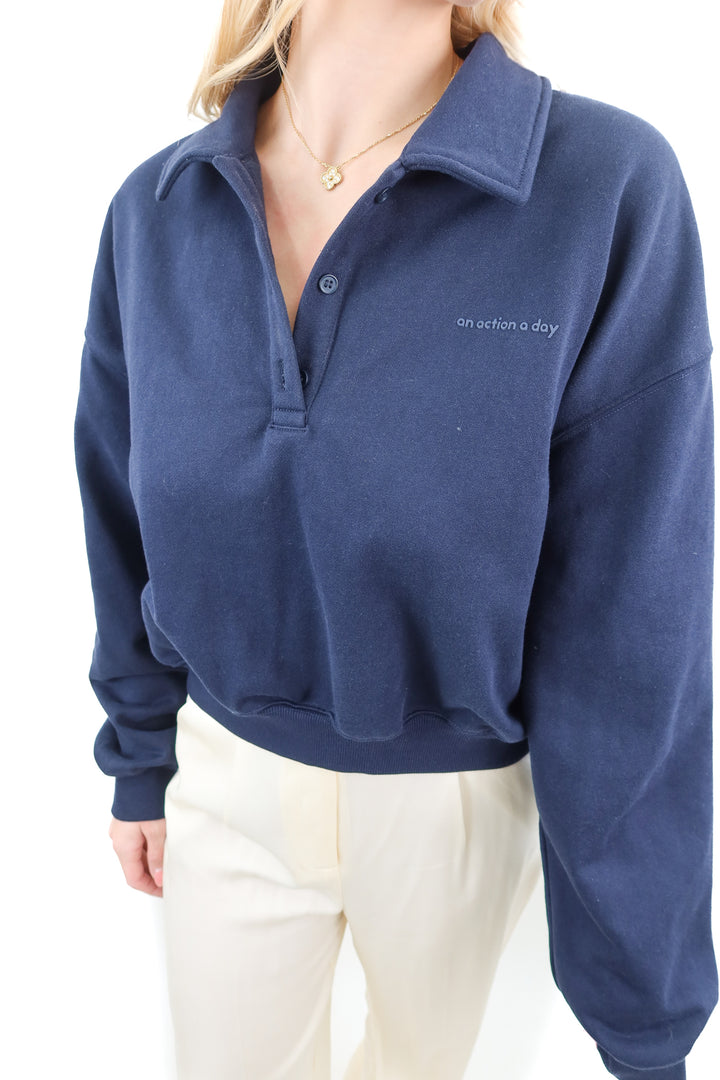 an action a day navy quarter zip (m; retail $130)