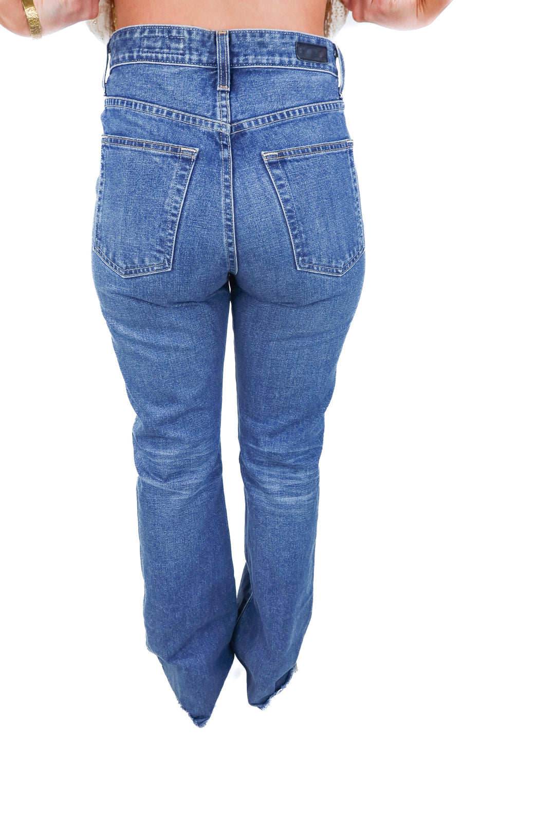 AG medium wash raw hem jeans (29R)
