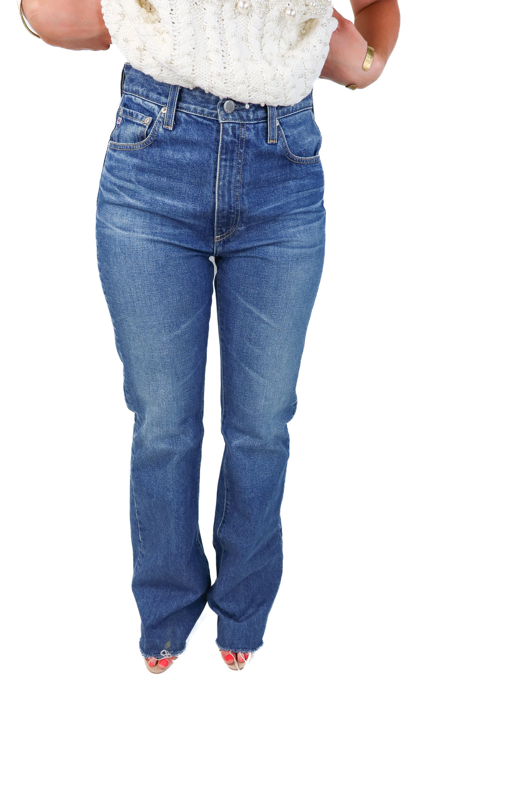AG medium wash raw hem jeans (29R)