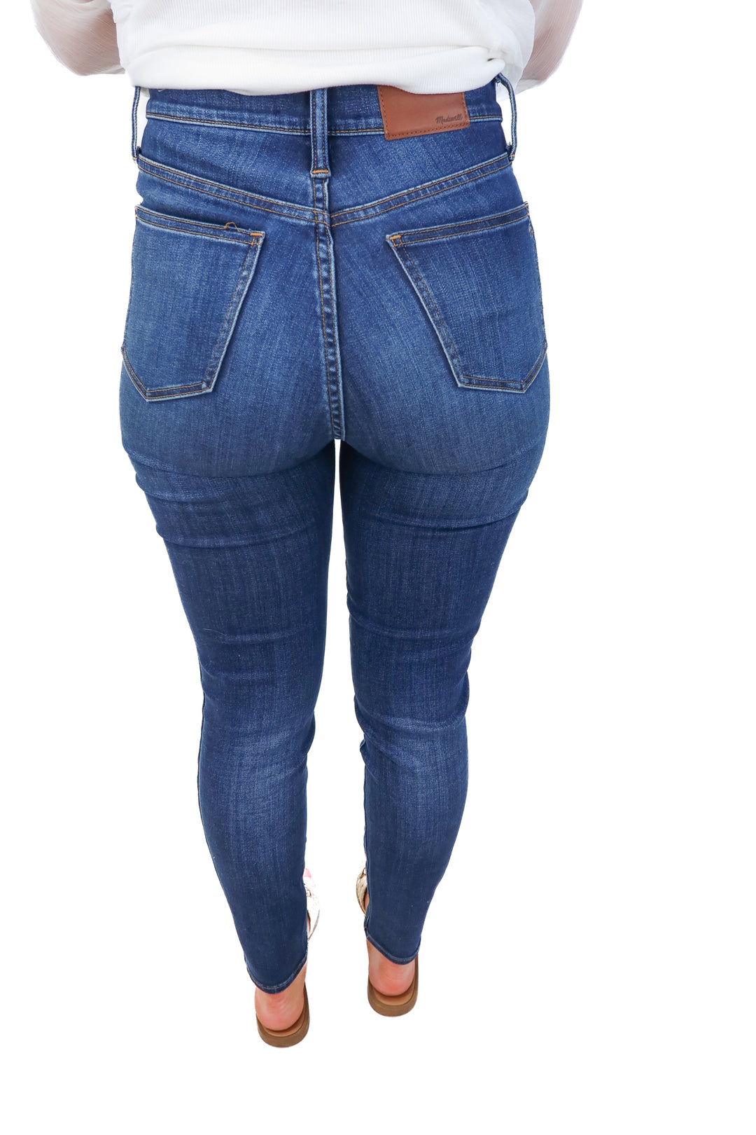 madewell medium wash skinny jeans (27; retail $128)