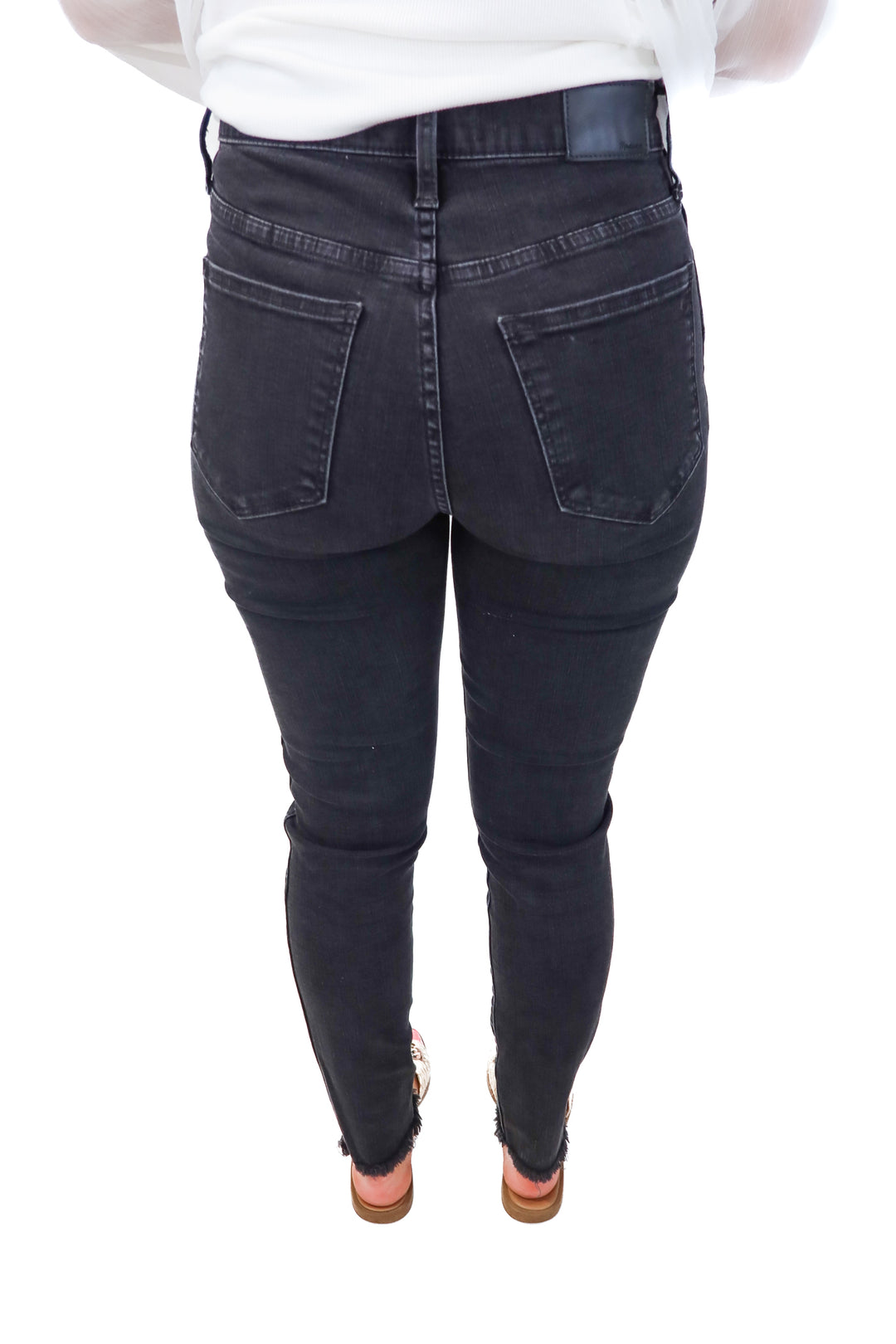 madewell black high-rise skinny jeans (27; retail $128)
