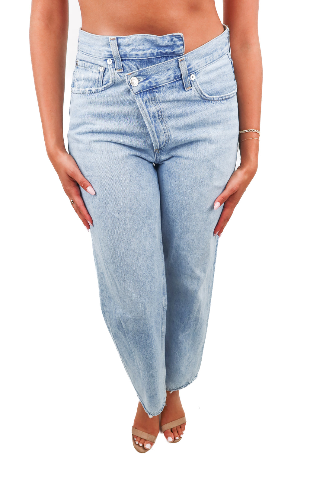 agolde light wash asymmetrical jeans (26; retail $278)