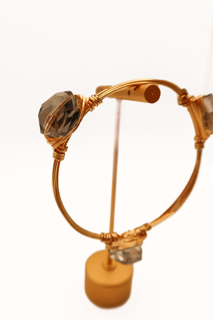Gold wire bracelet with crystals