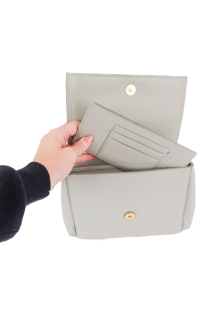 Haist cream leather clutch (retail $395)