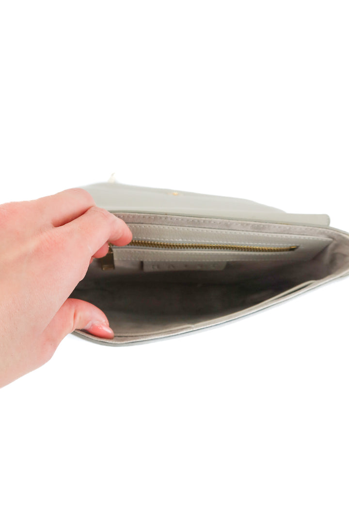 Haist cream leather clutch (retail $395)