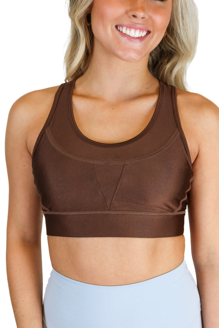 Alala dark brown sports bra (S; retail $65)