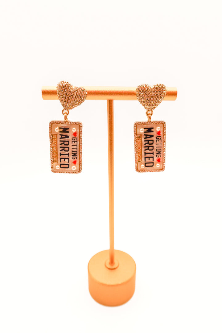 Getting married tag earrings