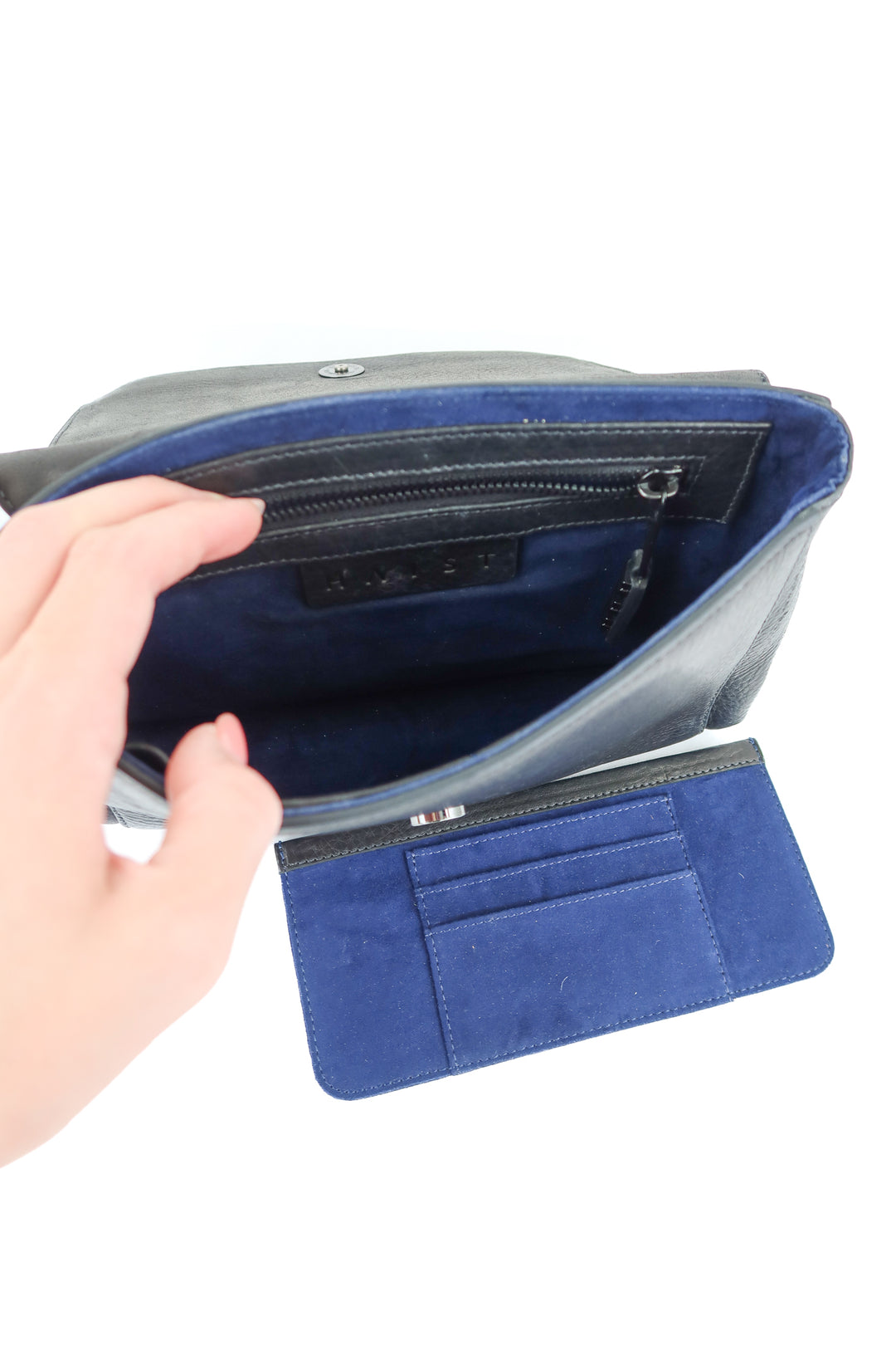 Haist black leather clutch (retail $395)