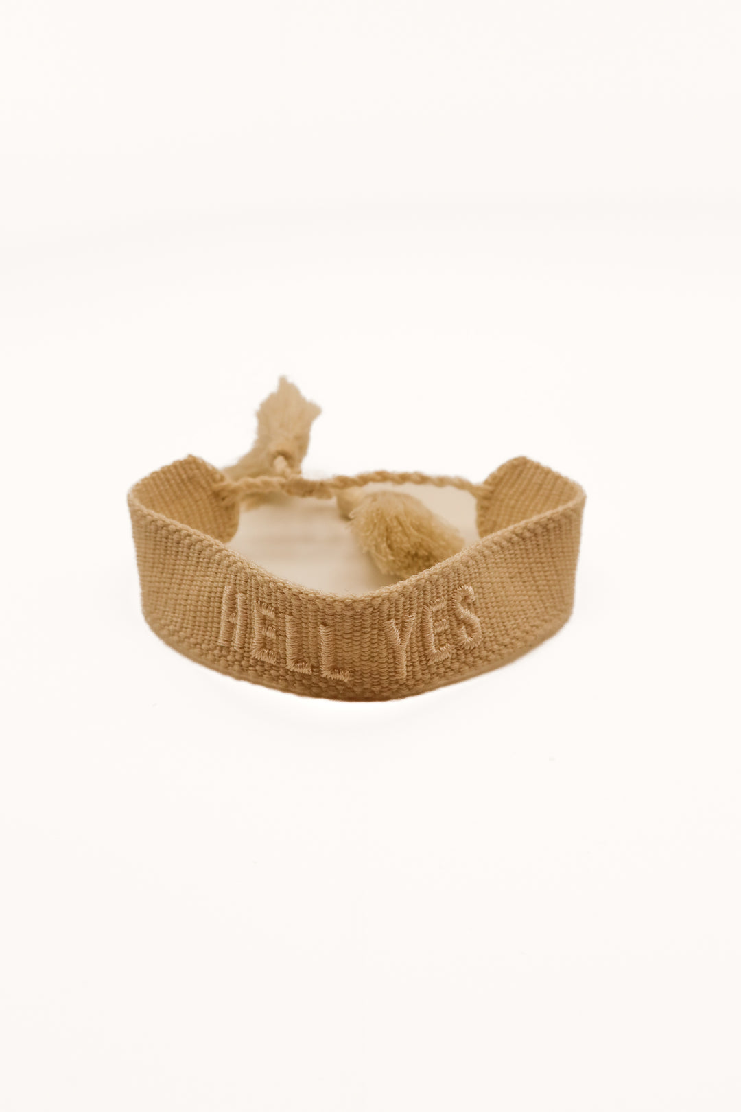 Ivory “Hell yes” knit bracelet