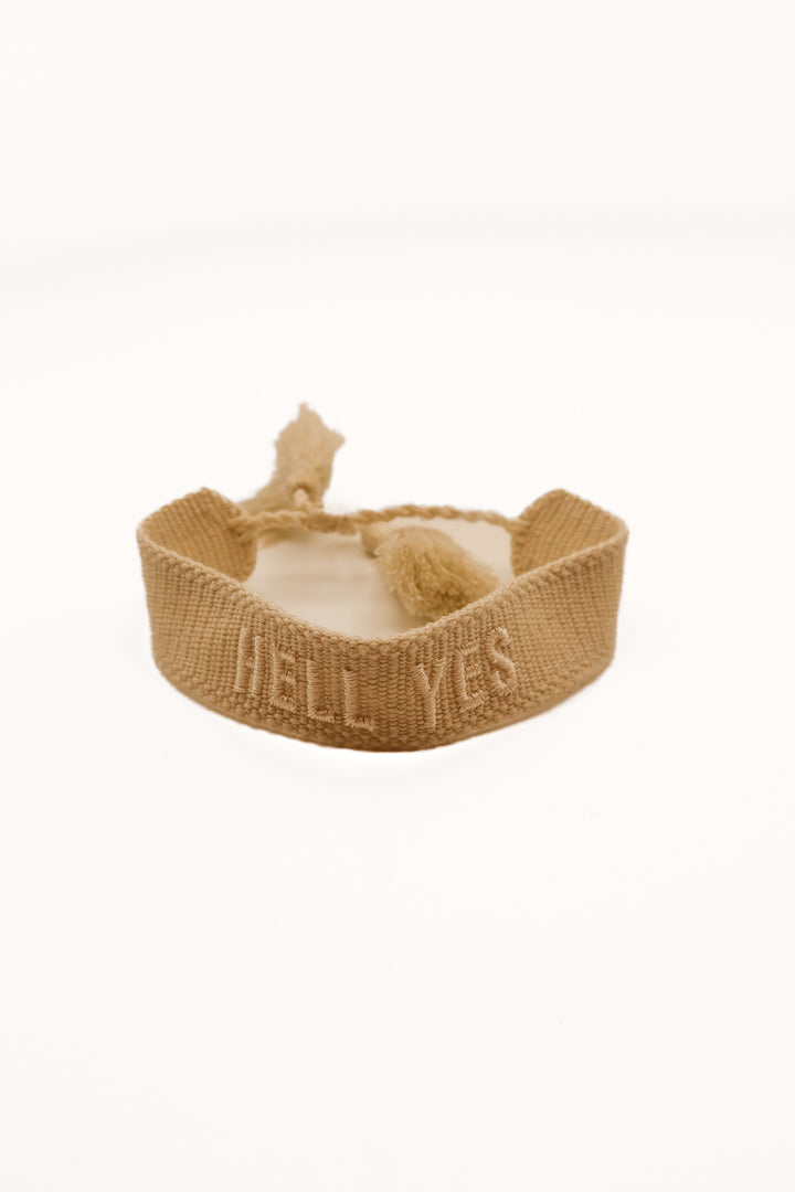 Ivory “Hell yes” knit bracelet