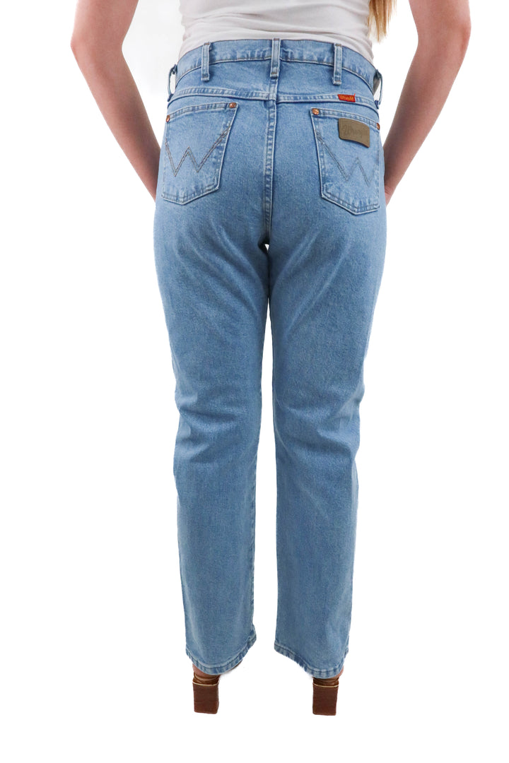 wrangler cowboy cut medium wash jeans (11 retail; $75)