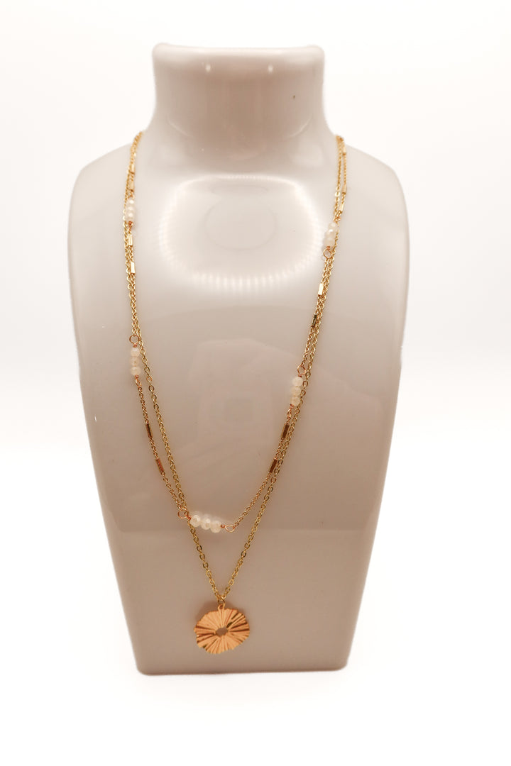 Gold layered necklace with circle pendant