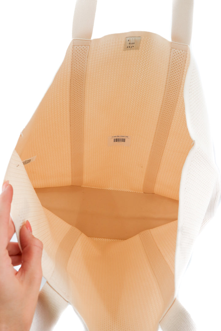 A new day cream tote