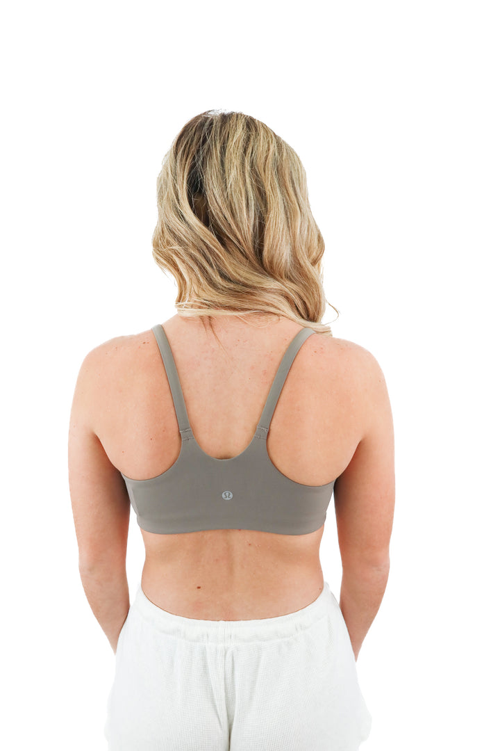 lululemon olive strappy sports bra (10; retail $58)