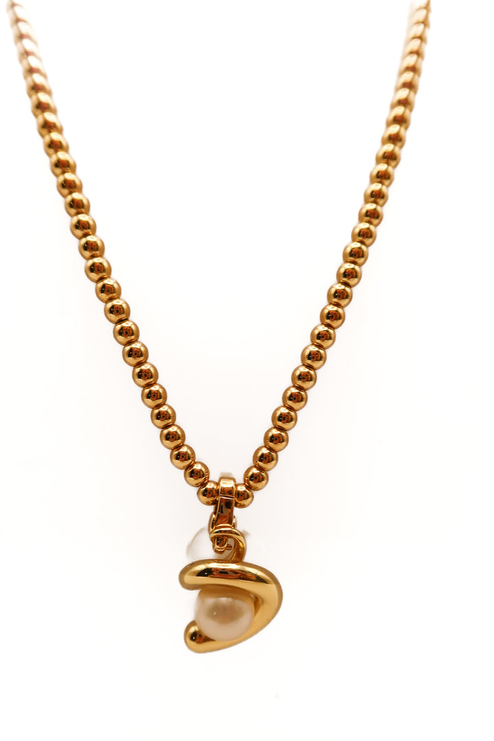 Jenny bird gold swirl pearl necklace (retail $148)