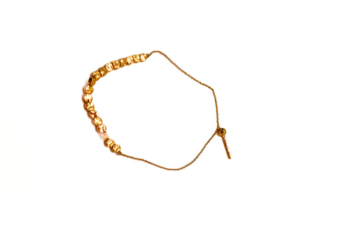 Gold hammered circles bracelet