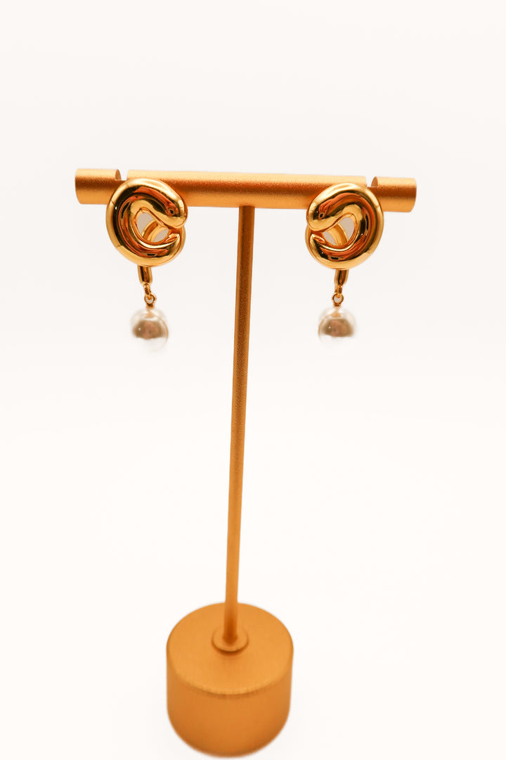 SOLD: Jenny bird gold swirl pearl earrings (retail $138)