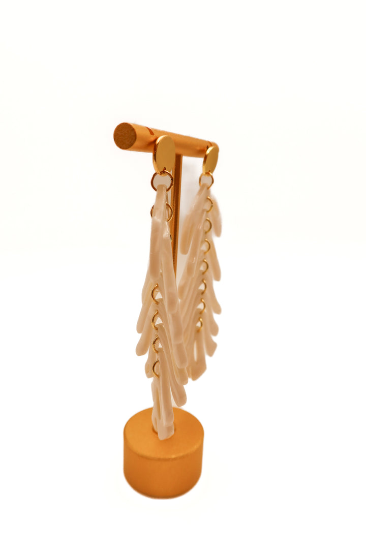 White/gold palm leaf earrings