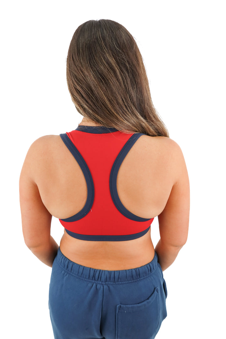 set active red sports bra with navy blue trim (M; retail $56)