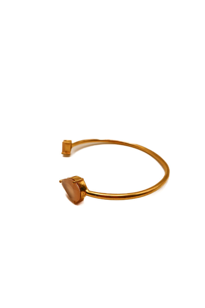 Gold bangle w/ pink gems