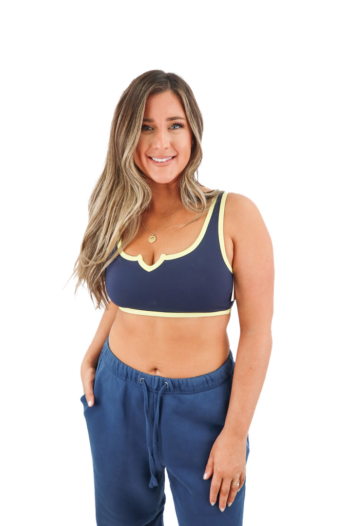 form navy/yellow sports bra (L; retail $68)