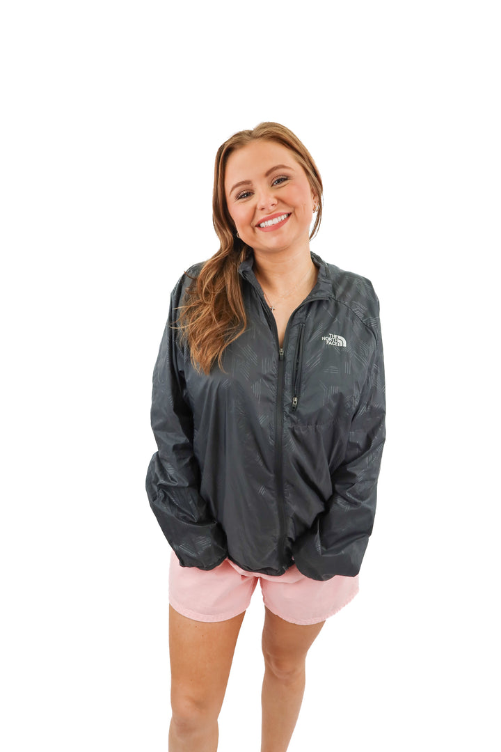 The North Face black windbreaker (L; retail $110)
