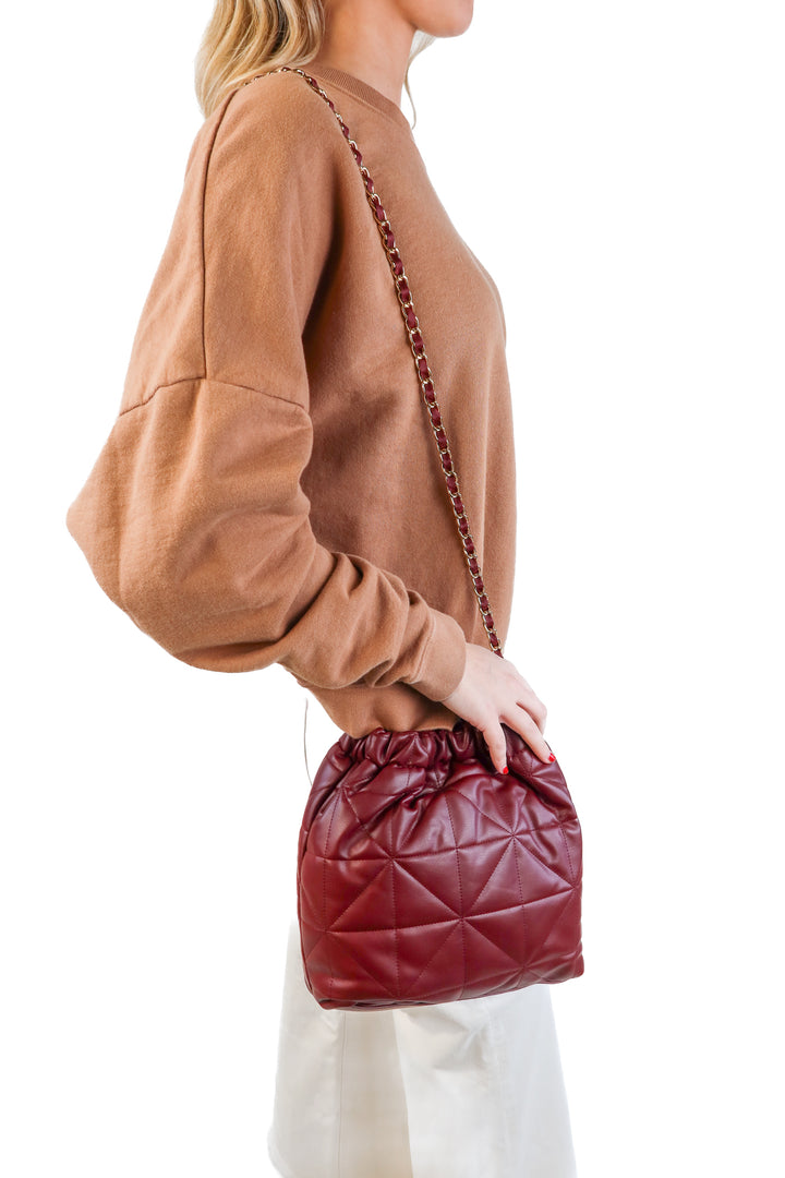 A new day burgundy quilted bag NWT (retails for $25)