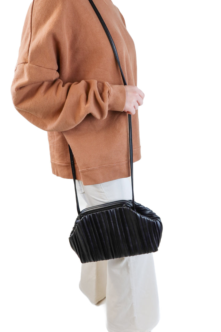 Black faux leather pleated clutch