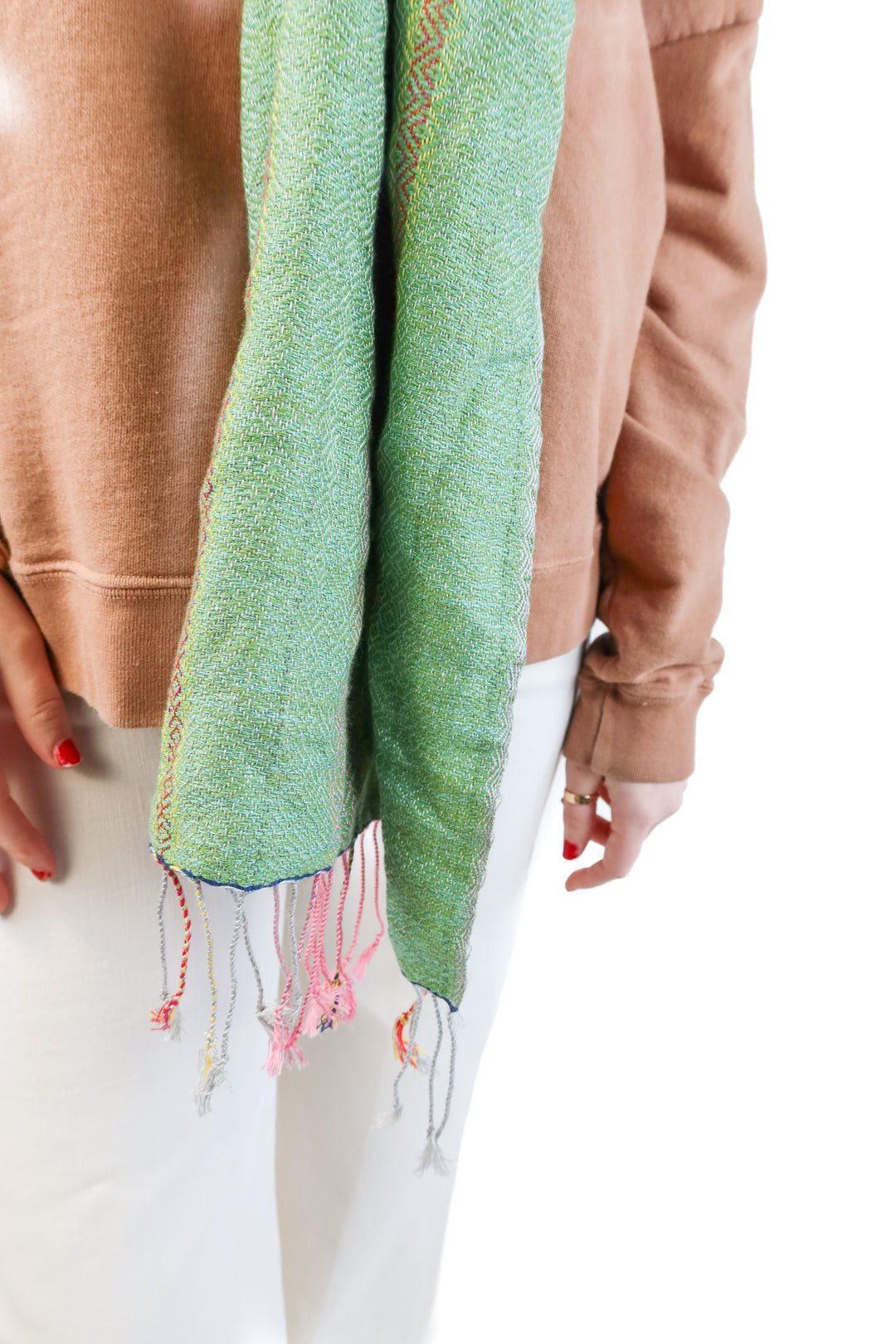 Green woven scarf w/ pink fringe