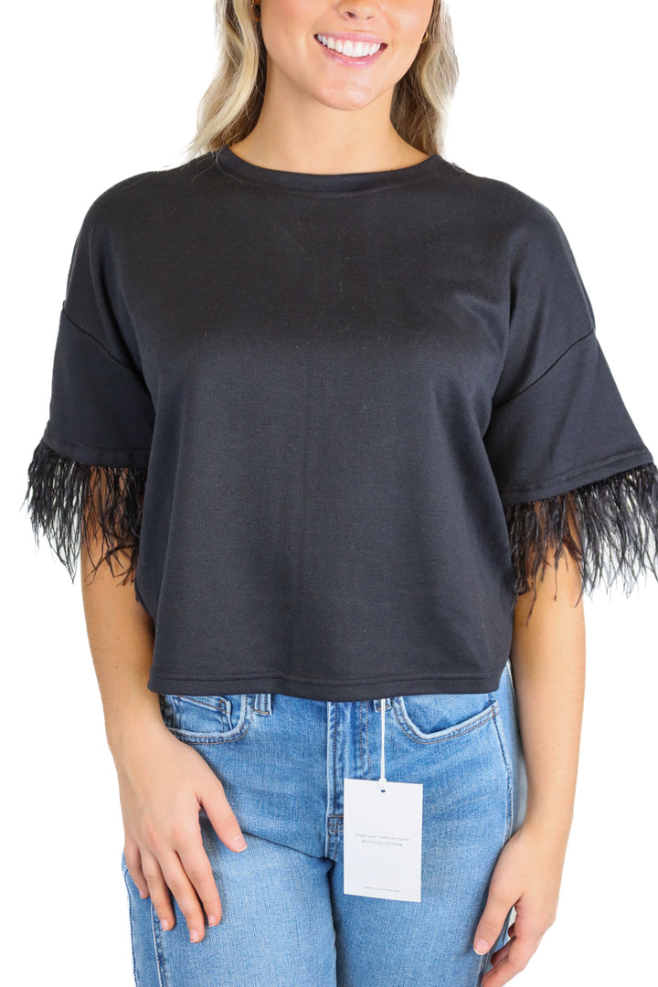 lucy paris black short sleeve feather top (s; retail $90)