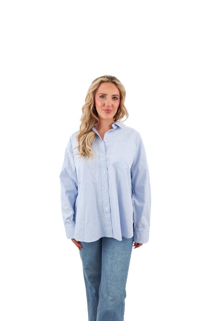 j. crew blue oversized button down top (S; retail $148)
