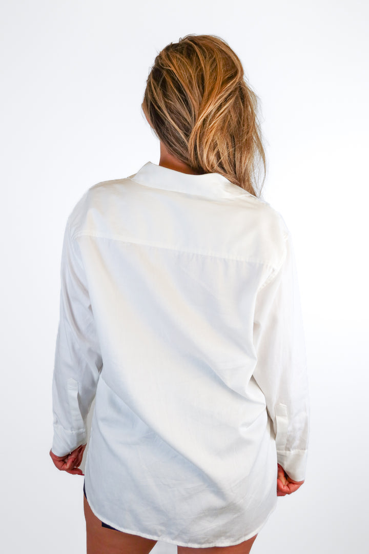 Able oversized white button down (XS; $128)