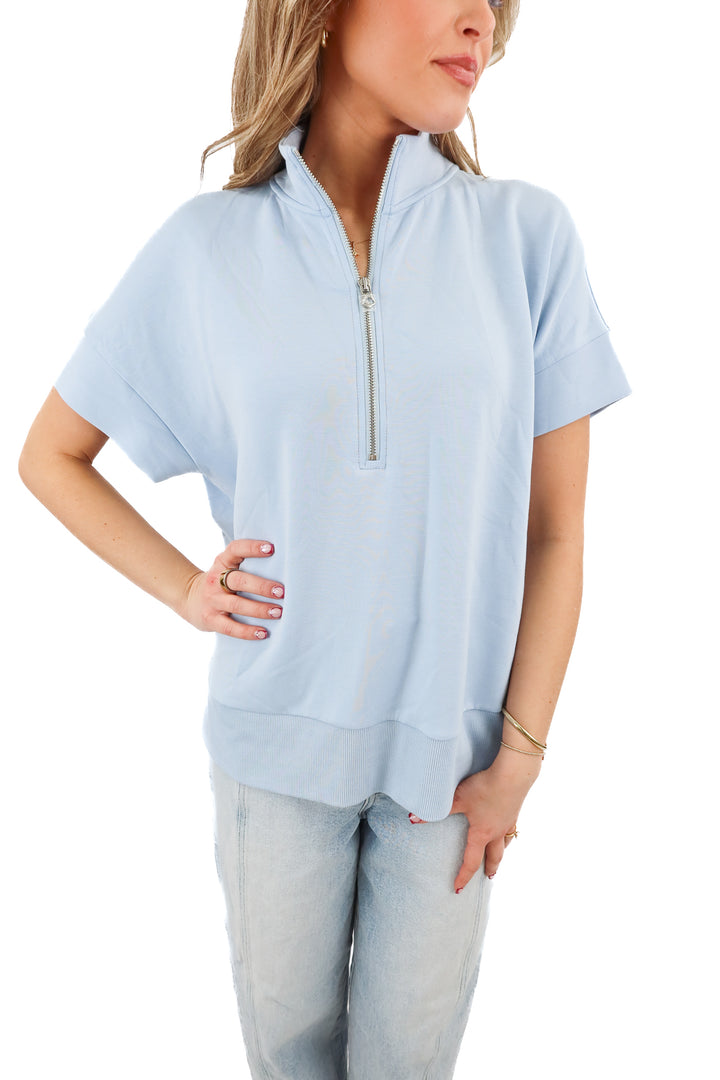 varley doublesoft blue half zip short sleeve top (S; retail $138)