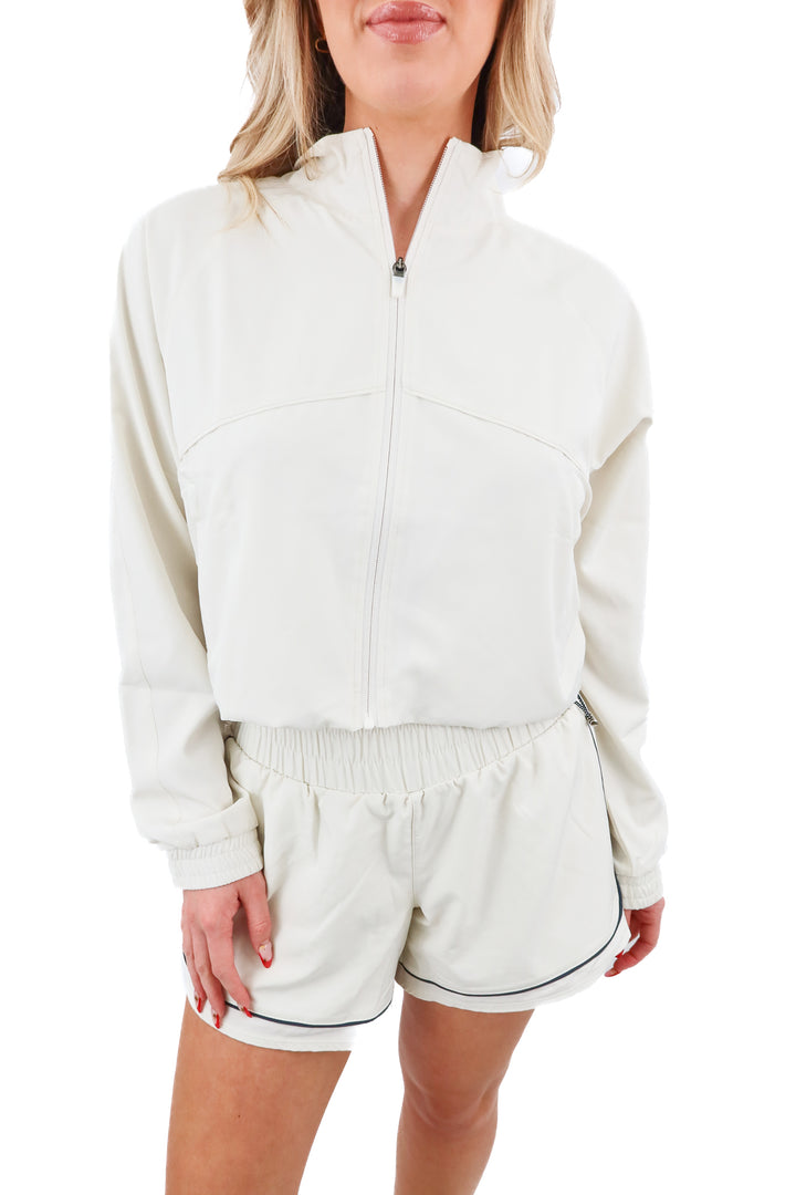 fore-te club attire cream cropped zip jacket & short set (m; retail $178)