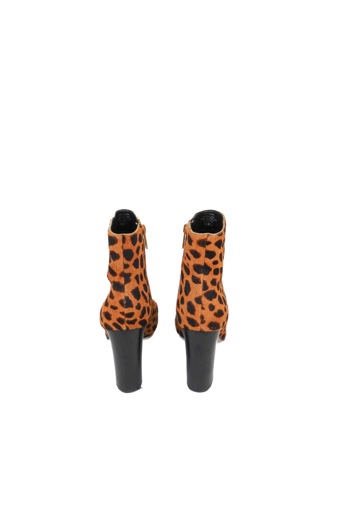 Vince Camuto spotted booties (8; retail $165)