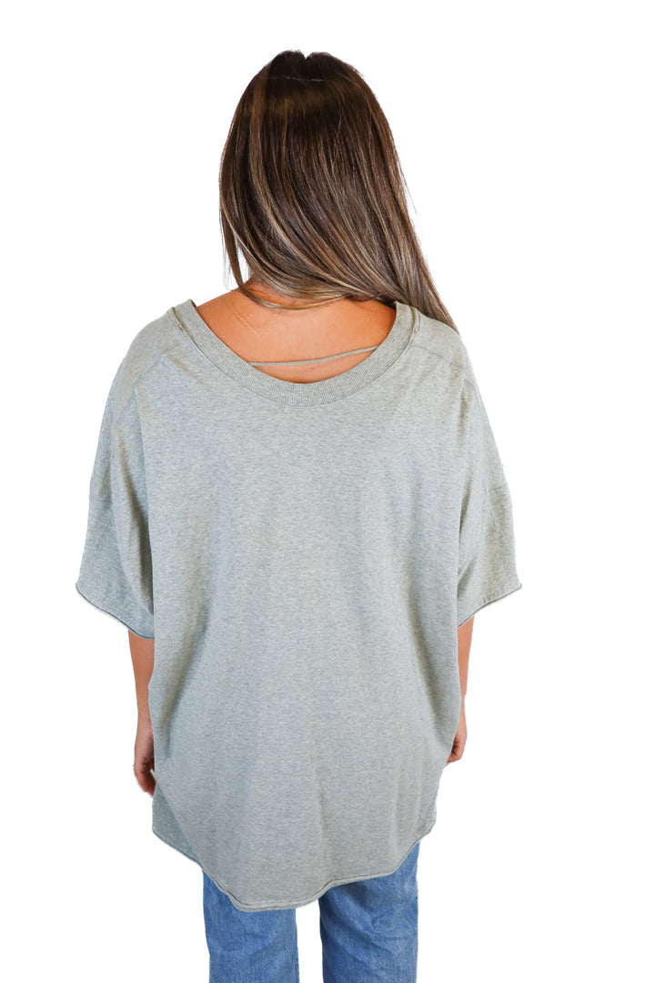 Free people light gray "V" neckline top (L; retail $65)