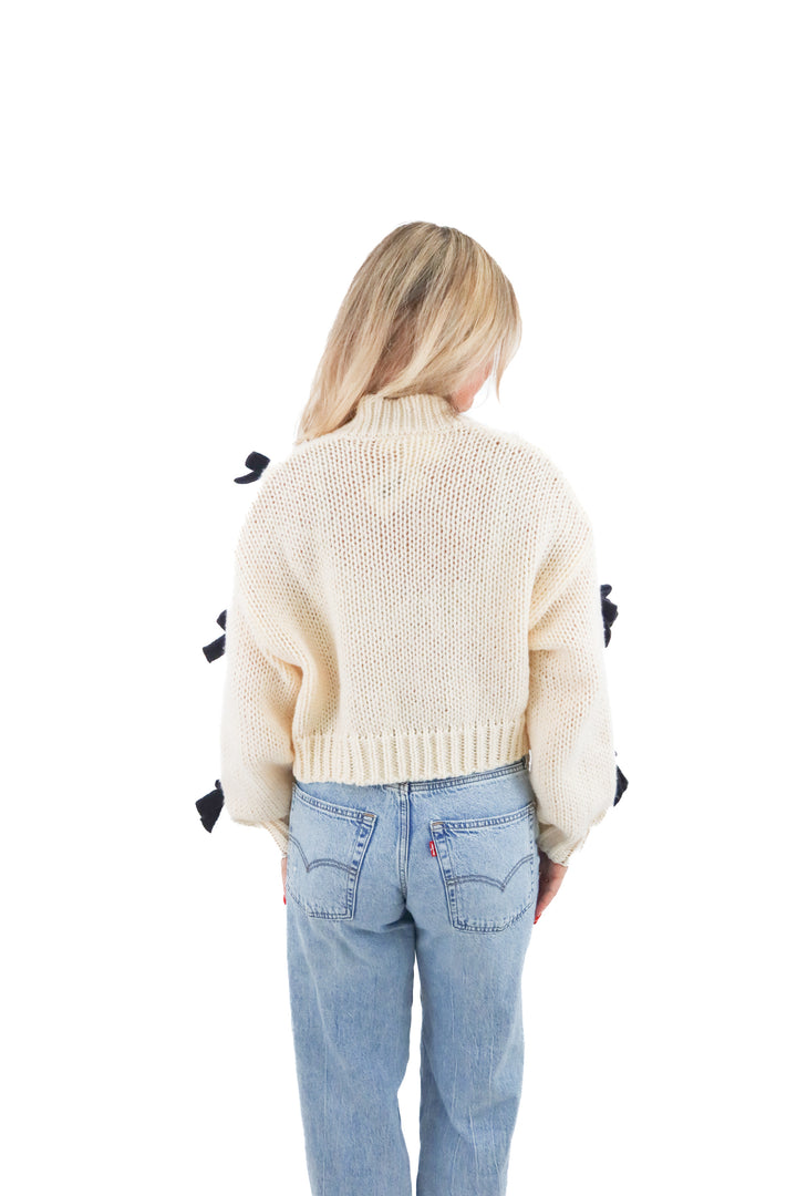 maeve cream cardigan w/ black bows (os; retail $125)