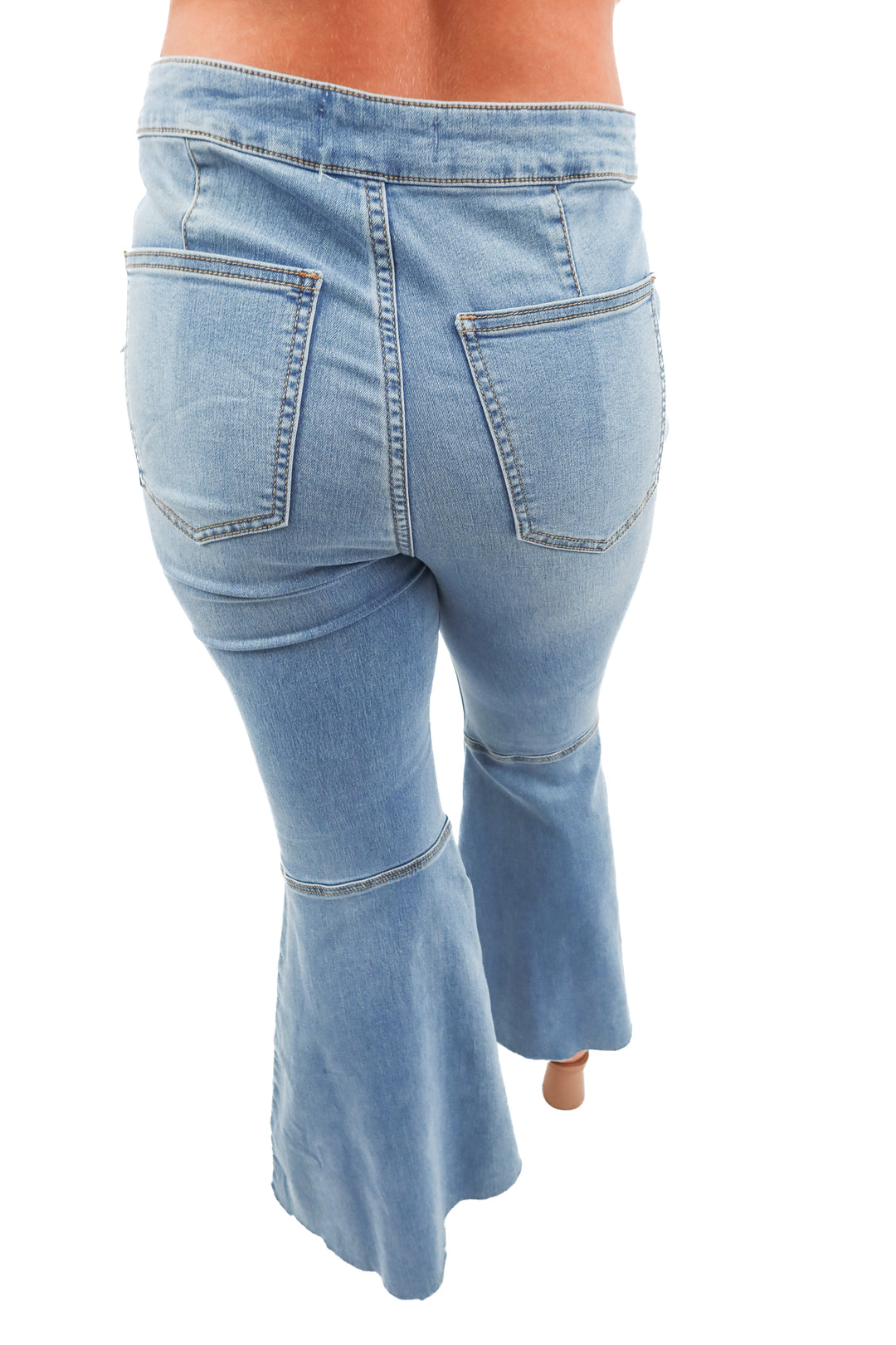 we the free light wash raw hem bell bottom jeans NWT (28; retail $78)