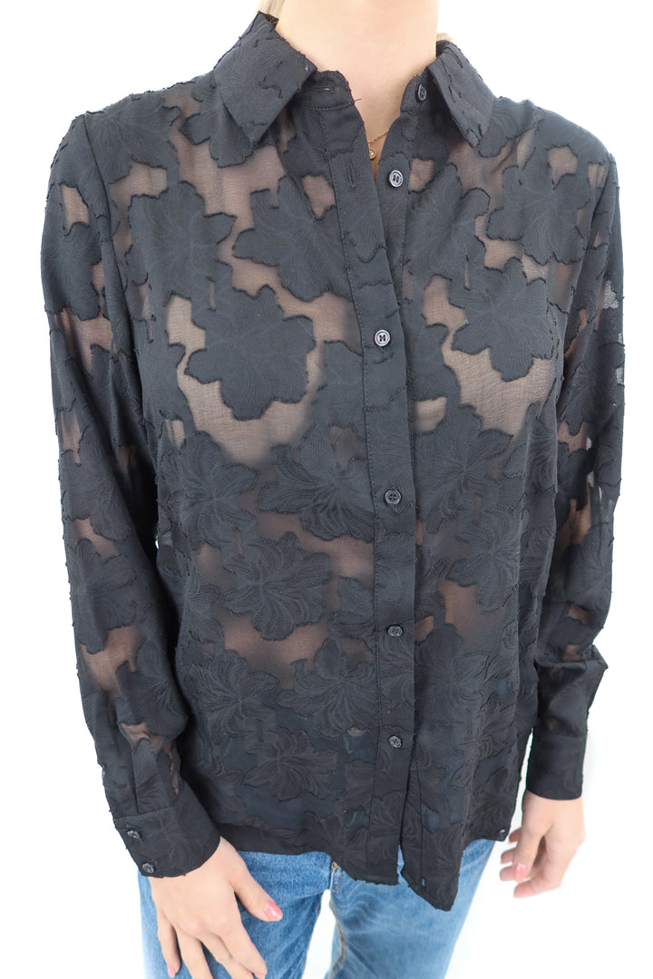 The Noli Shop black floral button down top (S; retails $148)