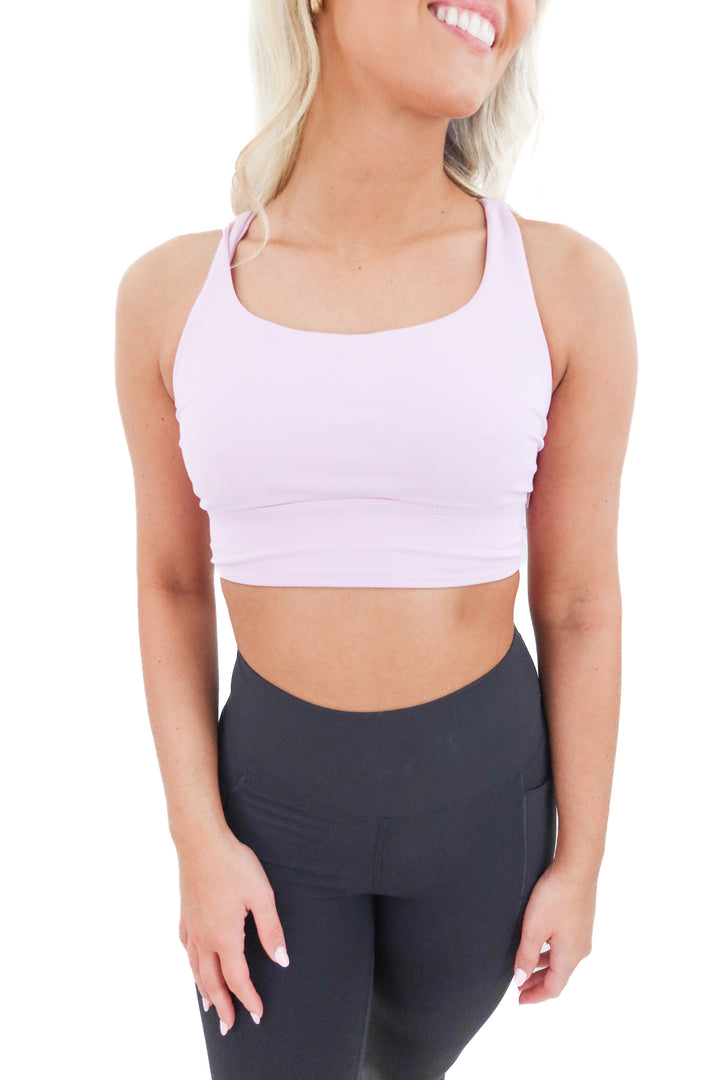 lululemon purple strappy sports bra (6; retail $58)