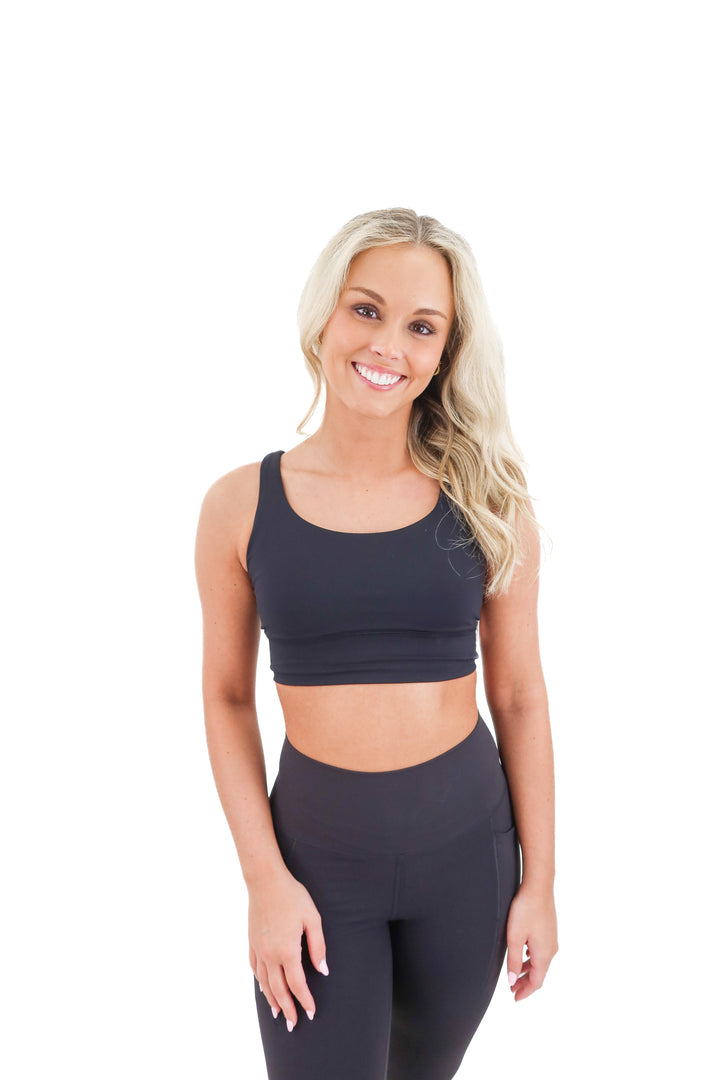lululemon black strappy sports bra (6; retail $58)