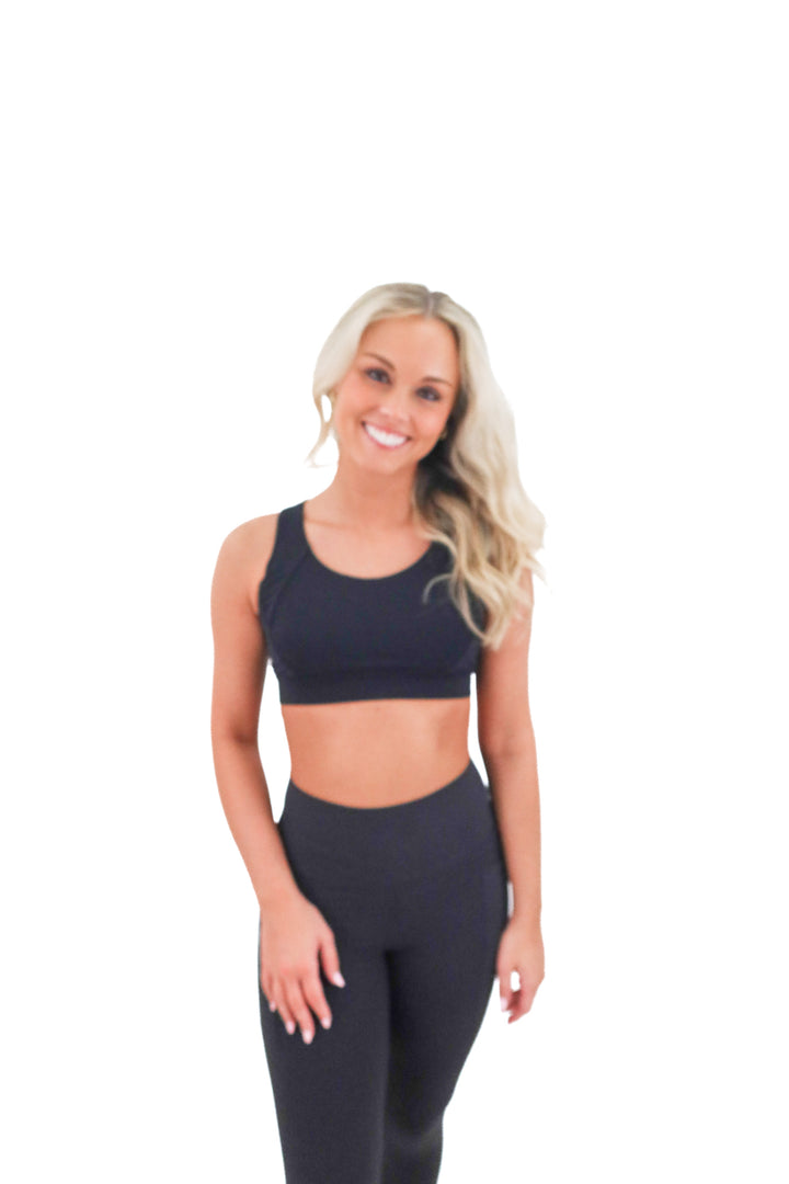 lululemon black strappy sports bra (6; retail $58)