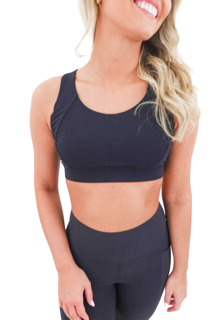 lululemon black strappy sports bra (6; retail $58)