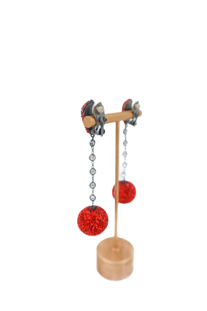 red sparkly drop earring (clip on)