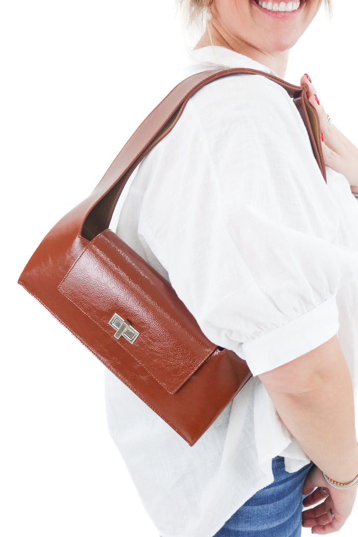 audette patent leather brown baguette shoulder bag (retail $530)