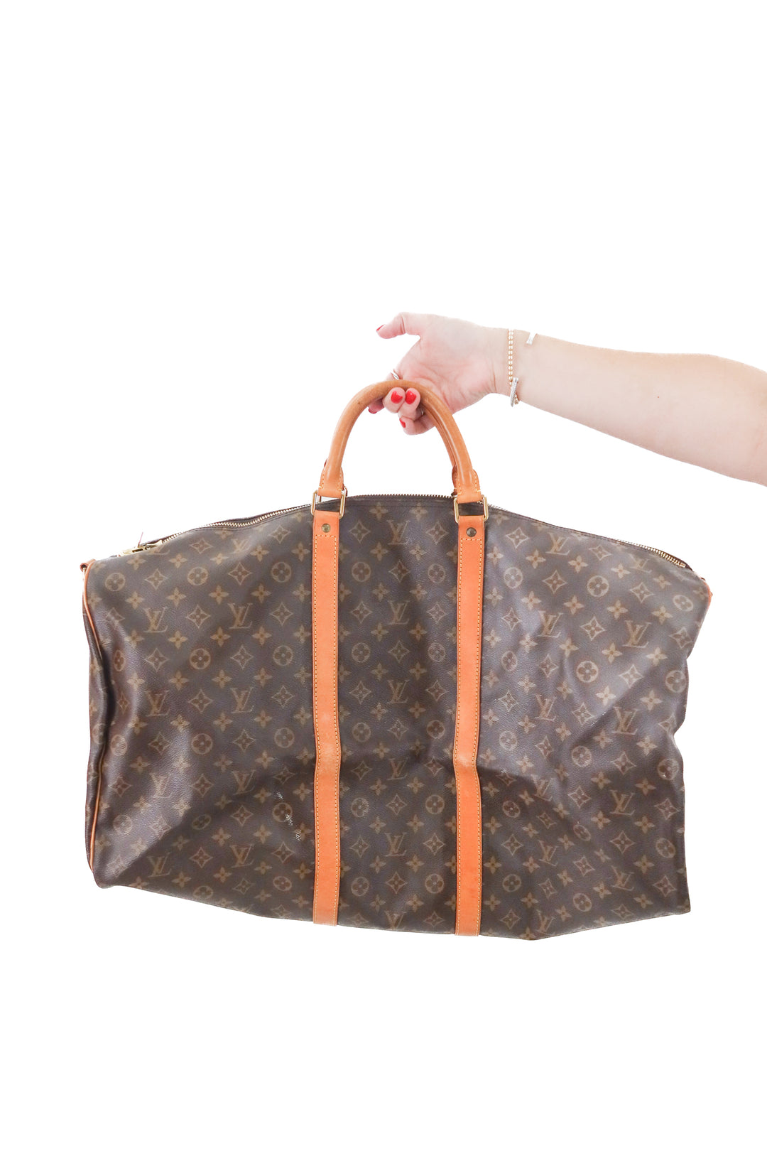 Louis Vuitton Keepall 60 monogram canvas (est. retail $2,700)