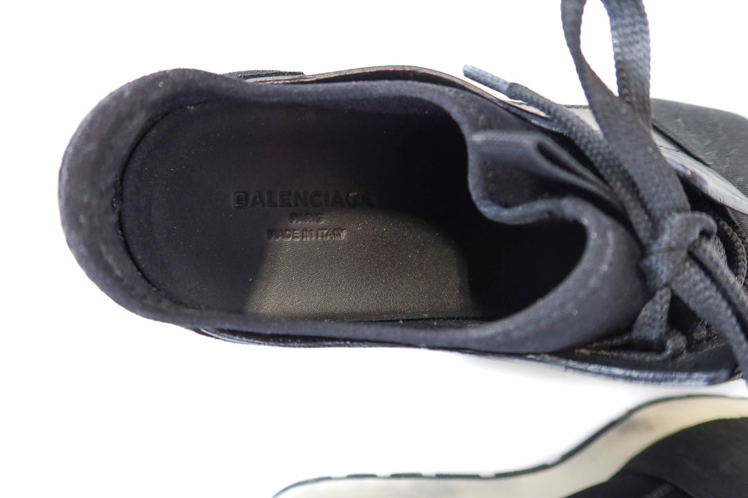 balenciaga black leather race runner sneakers (39/ US8-9; retail $518)
